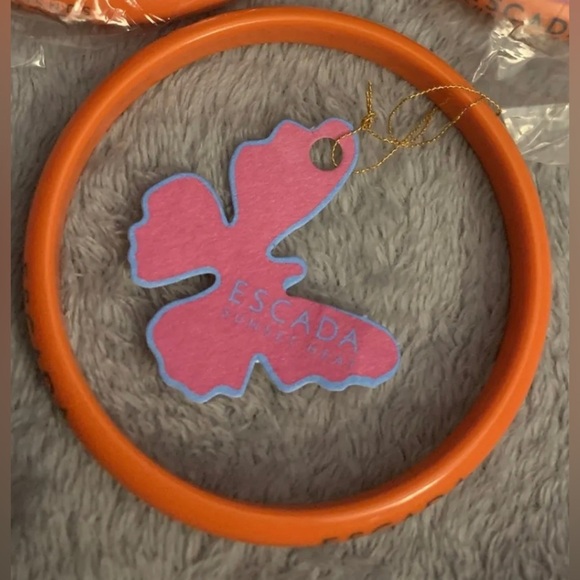 Vintage Auth Escada Orange Bangle bracelet-plastic w/ butterfly paper Escada tag - Picture 2 of 2